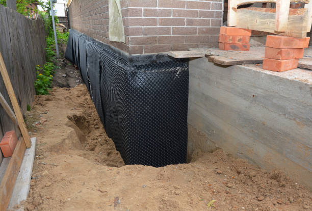 Happy homeowners after waterproofing job in Port Republic